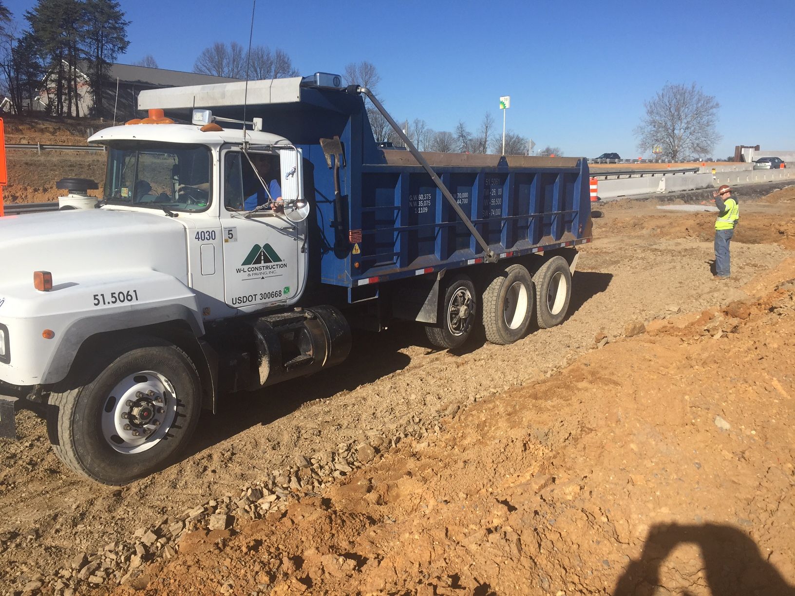 W-L dump truck on a graded site development job